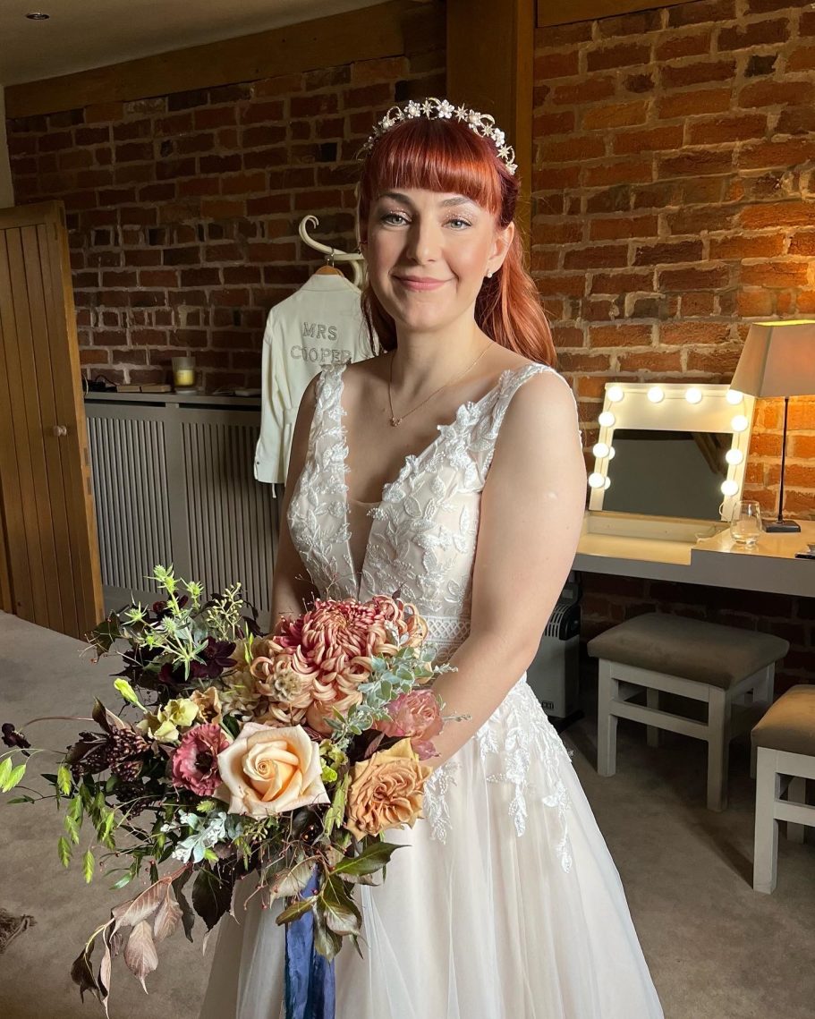 Bride with red getting married at Curradine barns
