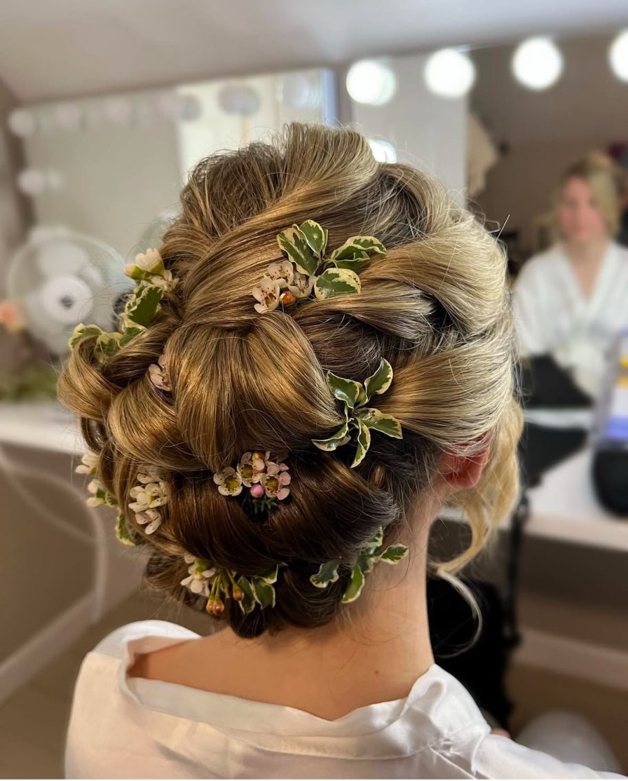 bride Textured up do with flowers