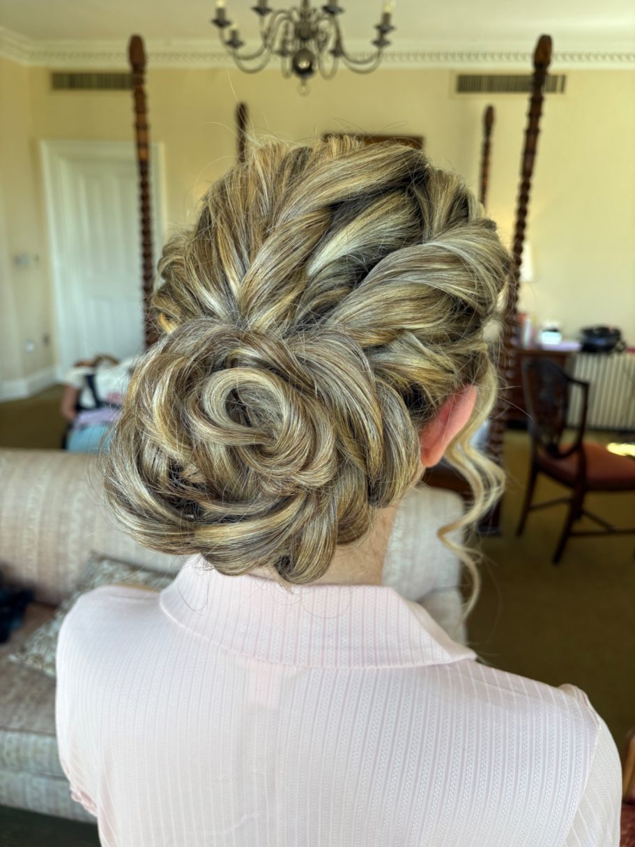 Bride hair twisted updo at Ettington Park hotel in Stratford upon Avon, Warwickshire