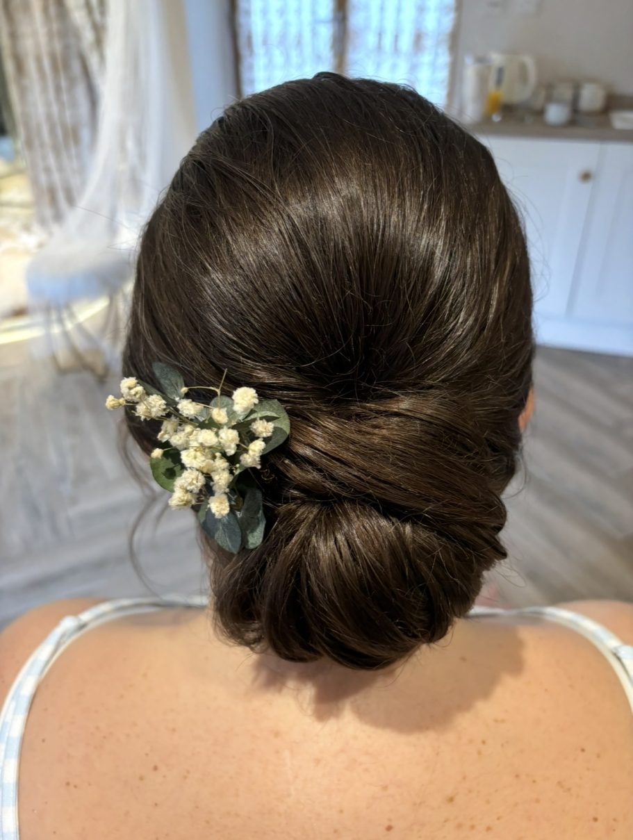 Beautiful sleek bridesmaid up do at Gorcott Hall, Redditch, Worcestershire